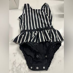 Rufflebutts one piece baby swimsuit with snap bottoms. EUC worn once. 12-18 mo.